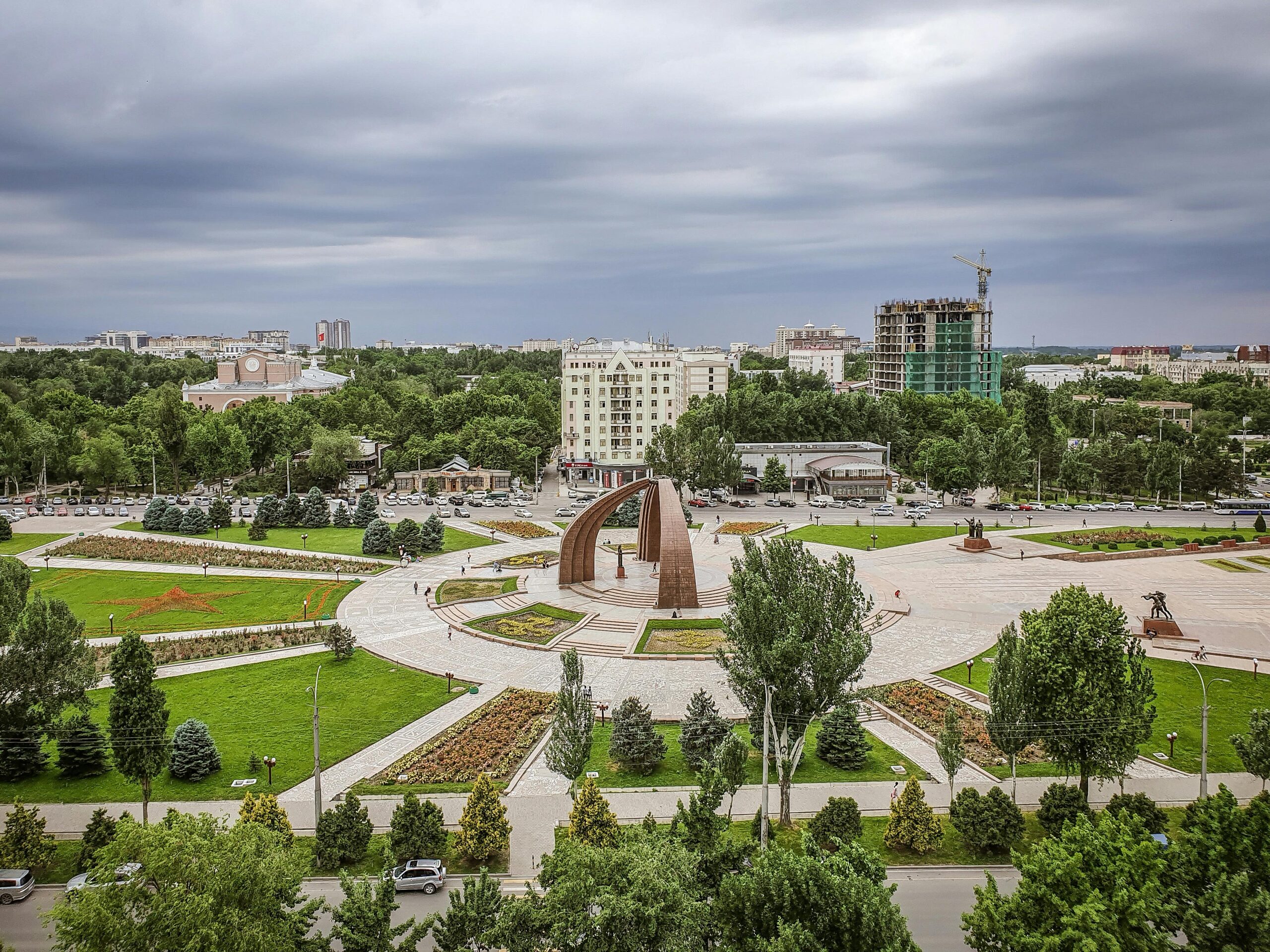 High angle view of Ala-Too Square in Bishkek, showcasing greenery and city architecture.