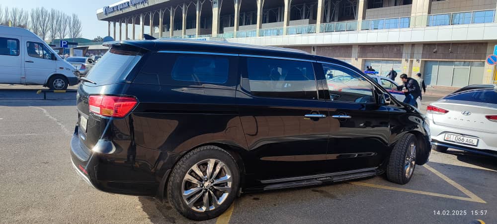sevem seats car kia carnival black for kyrgyzstan travel rent car with driver