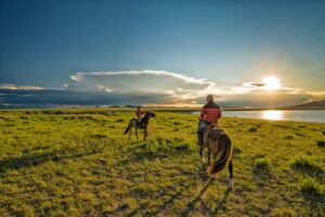 nomadic children, sunset, horse, meadow, nature, lake, bayan audio bo, mongolia