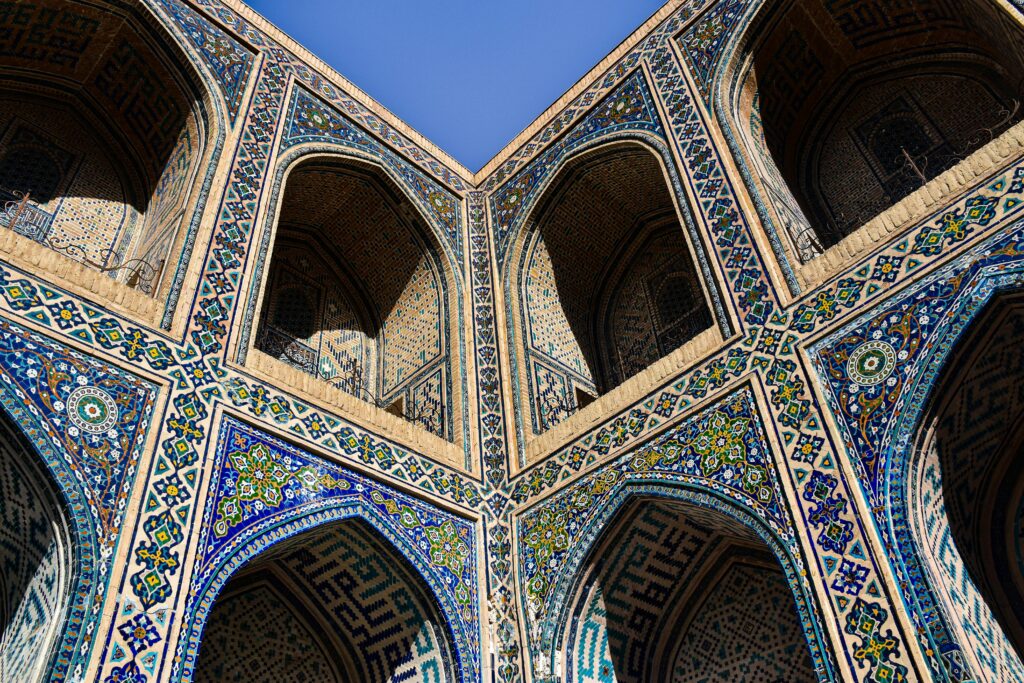 Beautiful mosaic-covered arches of a UNESCO World Heritage Site madrasa in Samarkand.
