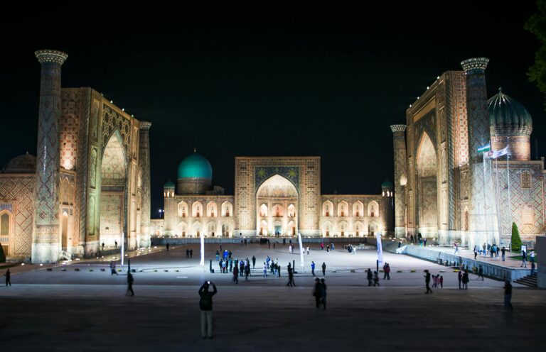 Beautiful night view of Registan Square, a historic Islamic architecture site in Samarkand, Uzbekistan.