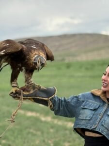 guest with eagle in kyrgyzstan