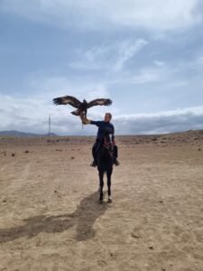 guest with eagle in kyrgyzstan